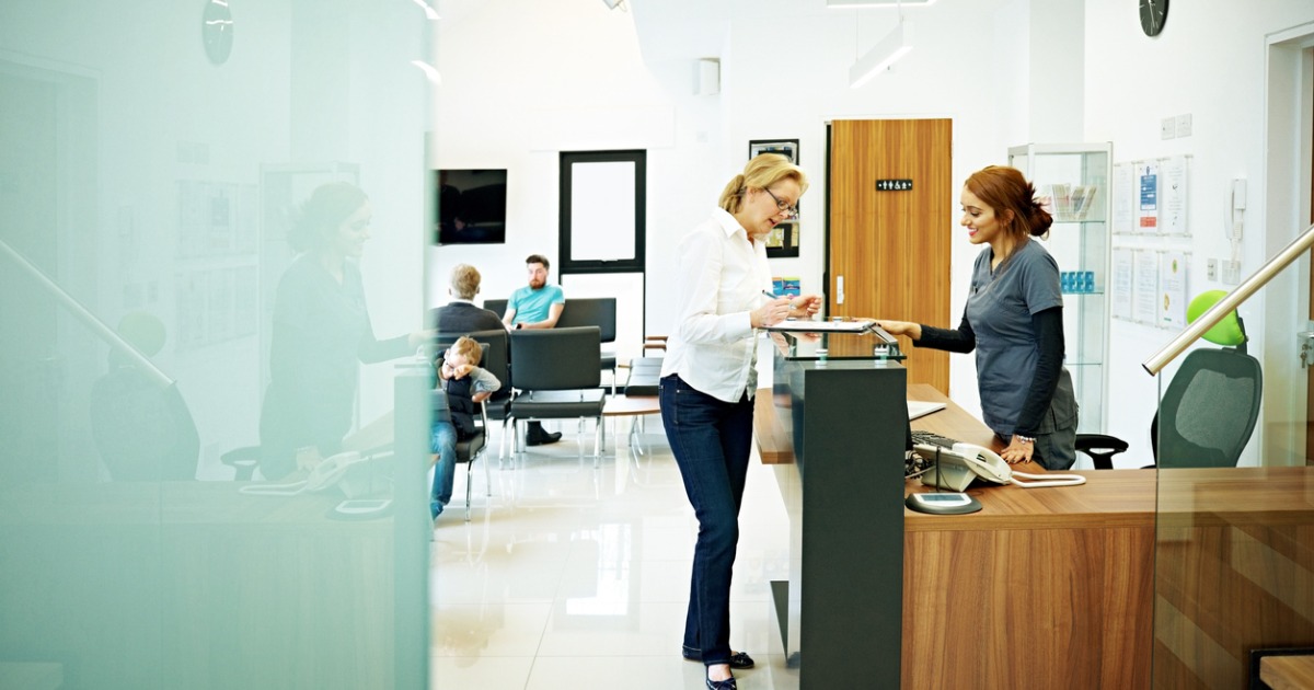 Dental office with staff and patients
